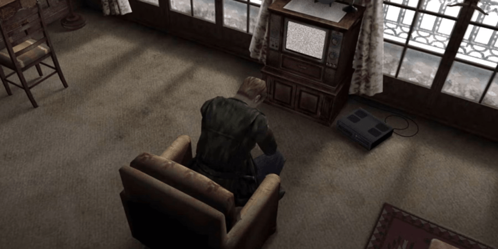 James, protagonista de Silent Hill 2, está num quarto de hotel olhando para uma TV antiga, arrasado depois de descobrir a verdade sobre a morte da sua esposa