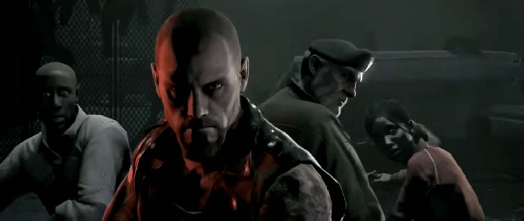 Uma imagem da sequência cinematográfica introdutória do jogo Left 4 Dead que mostra os quatro personagens do jogo agrupados lutando contra uma horda de zumbis. Da esquerda para direita estão: Louis, Francis, Bill e Zoey