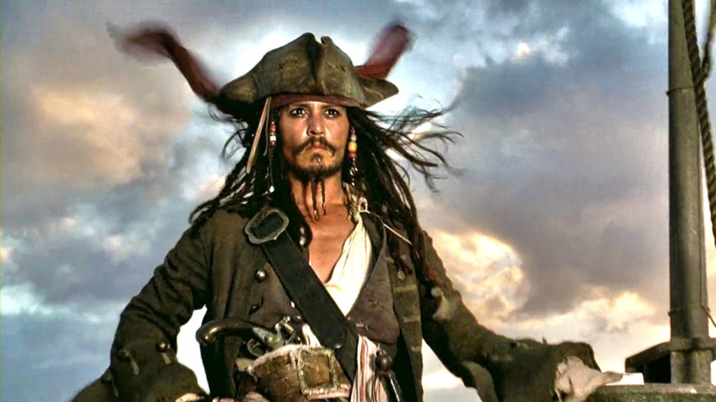 Foto do Capitão Jack Sparrow, interpretado por Johnny Depp, da franquia Piratas do Caribe, o maior ícone da pirataria do cinema contemporâneo